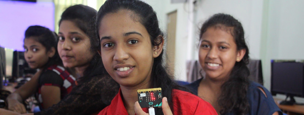 Sri Lankan girls in the classroom holding a Micro Bit