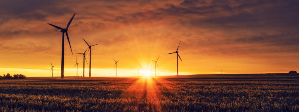 Wind turbines at sunset