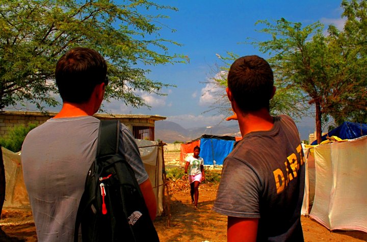 Two Help.NGO workers in a village