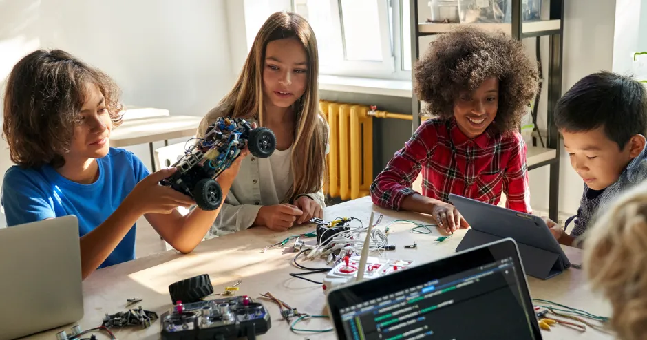 Students using a computer.