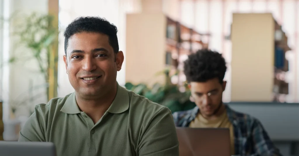 Teamwork in a modern workspace, symbolizing the role of trust in Internet connectivity and use.