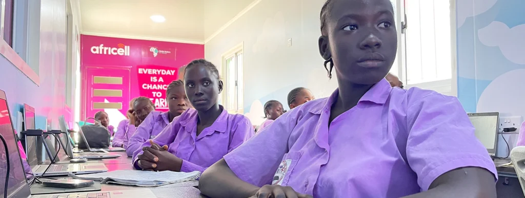 Teenage African girls in an ongoing computer lab