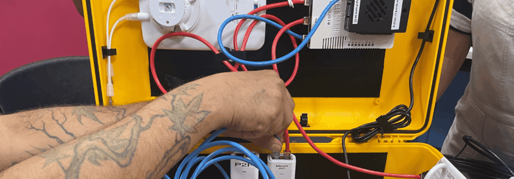 A man is connecting the Internet wires.