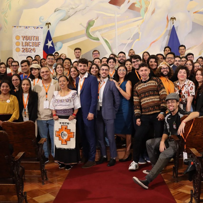 A huge group of young event participants pausing for a group photo