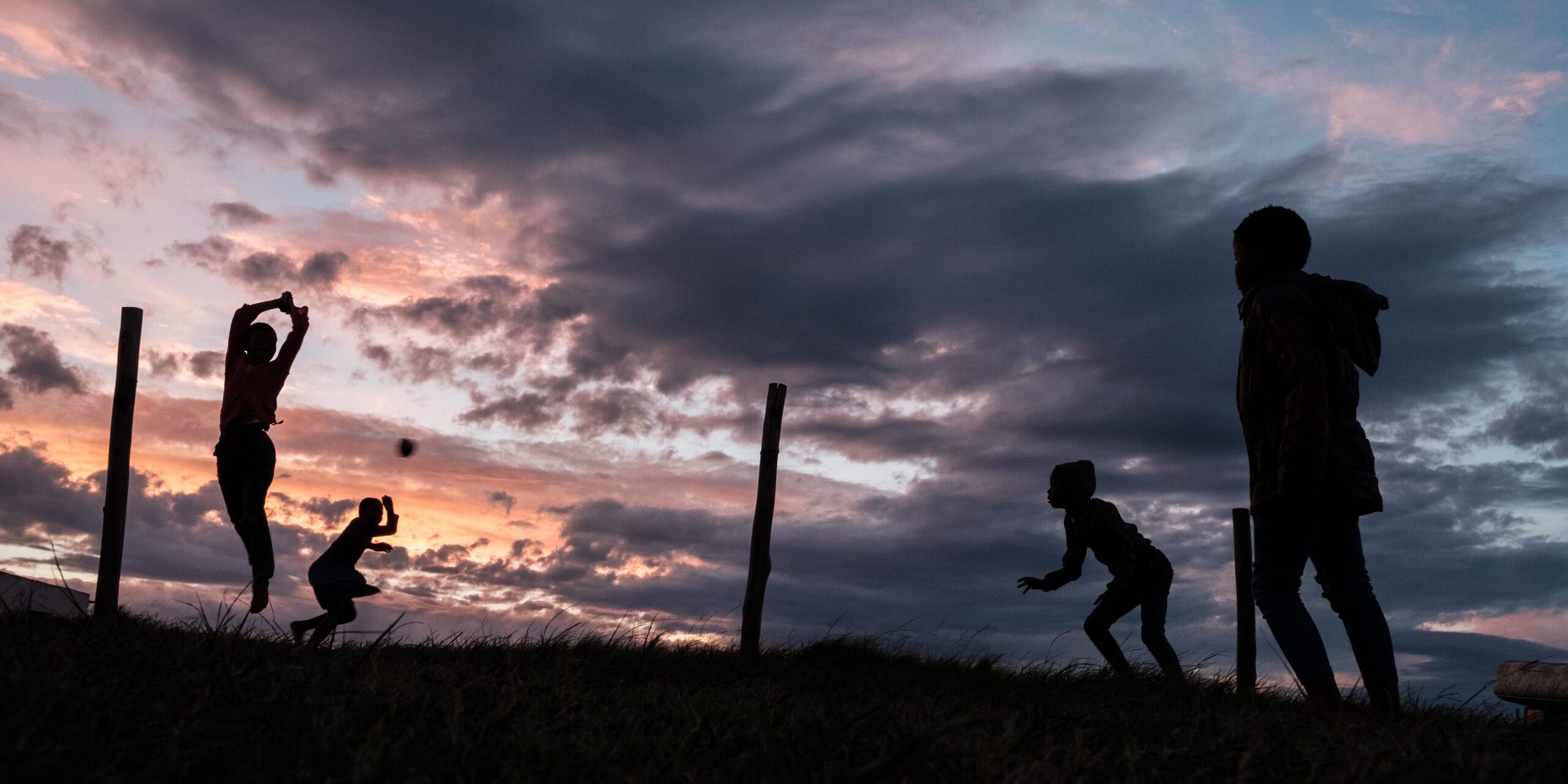 Children playing dodgeball as the sun sets in the village of Mankosi in the Eastern Cape province of South Africa on 8 March 2018.